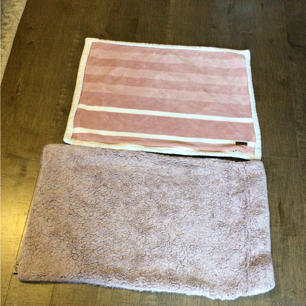 Two Ugg pillow shams